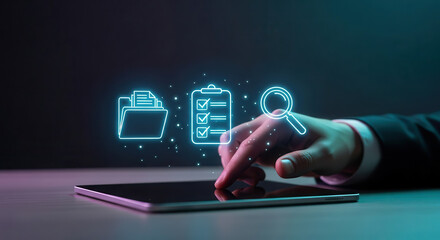 Hand of a business professional interacting with a digital tablet, showcasing holographic icons of files, checklist, and magnifying glass, representing modern technology and organization