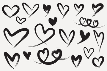Hand drawn black brush heart doodle set