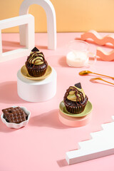 A Cupcake is a small, single-serving cake baked in a small cup-shaped mold, often lined with paper