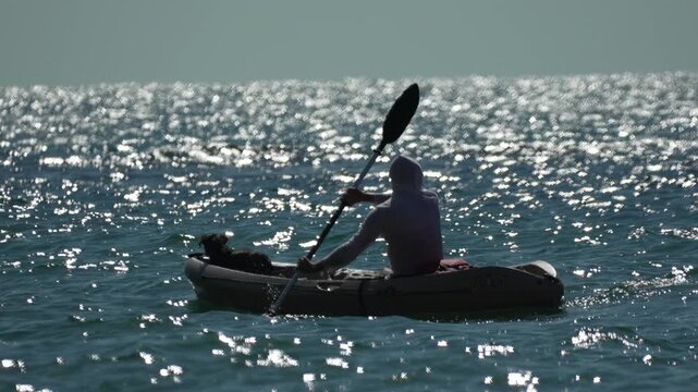 Kayaking Ocean Silhouette Sparkles On Waves With Dog