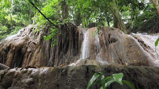Waterfall made from sedimentary limestone that has accumulated in layers