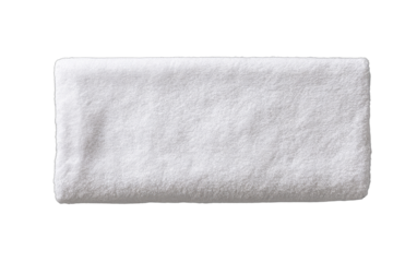 A single, soft, rectangular, neatly folded white towel isolated on black