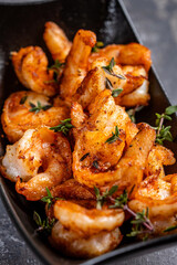 Spicy grilled shrimp with herbs closeup