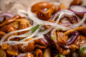 Marinated forest mushrooms with sliced onion