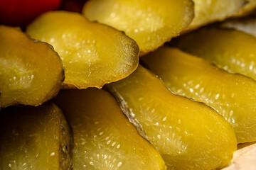 Pickled cucumber slices closeup texture