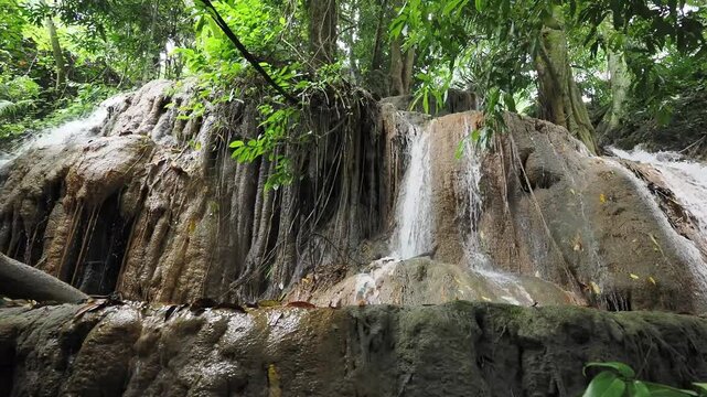 Waterfall made from sedimentary limestone that has accumulated in layers
