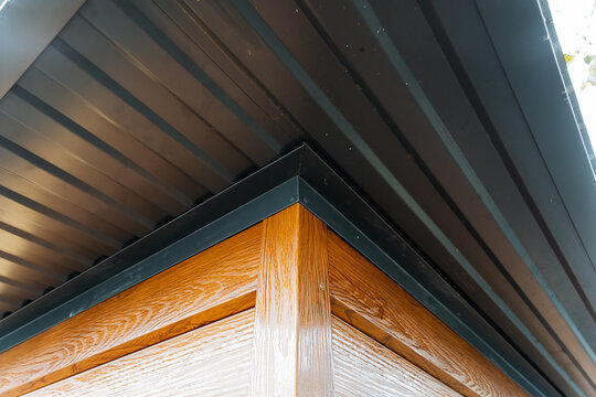 exterior eaves overview, detailed view of exterior eaves, closeup of exterior eaves with materials and design, comprehensive description of exterior eaves for renovation projects