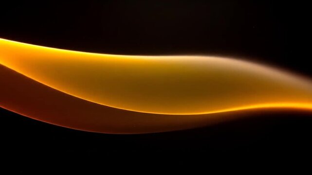 A surrealist abstract of golden light and nebulous formations against a backdrop of deep darkness