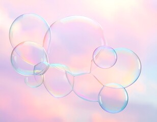 Several translucent, colorful bubbles floating against a soft, pink sky