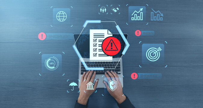 Cybersecurity risk checklist concept with warning symbol above laptop and digital business icons on blue background during data protection analysis.