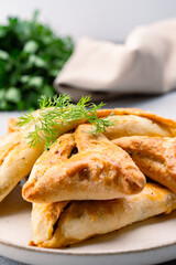 Homemade triangular pastry with spinach and cheese. A traditional Middle Eastern dish.
