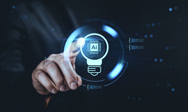 Human hand touching digital AI light bulb symbol with futuristic interface, showing artificial intelligence tech concept on dark background..