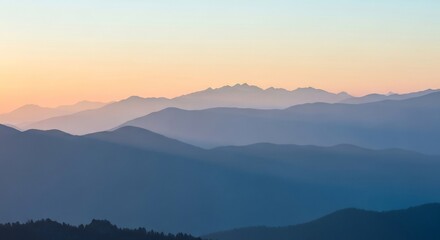 Serene Mountain Range at Sunset - A Landscape of Tranquility.