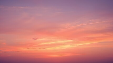 Obraz premium High-resolution, natural sky background featuring a blend of warm and cool tones, including striking shades of pink, orange, and light purple.