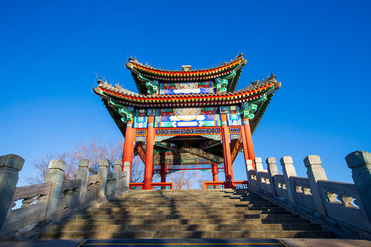 Lian Bridge and pavilion sunrise scenery on West Dyke in Summer Palace, Beijing, China