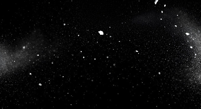 White Dust Particles on Black Background
