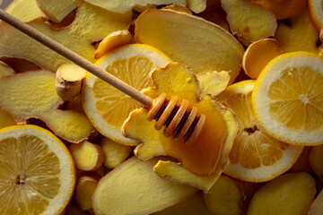 Honey with fresh ginger and lemon slices.