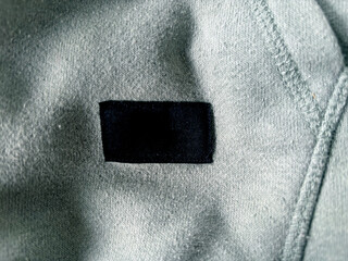 Close-Up Of Black Tag On Fabric