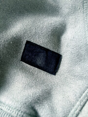 Close-Up Of Black Tag On Fabric