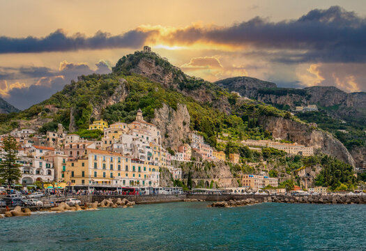 Procida island colorful town with harbor at summer with flowers, Italy