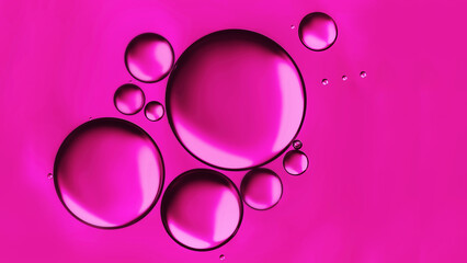 Abstract background, pink oil drops on water surface. Beautiful, natural macro abstract wallpaper.