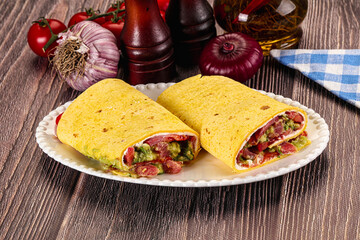 Burrito with tuna and vegetables wrap