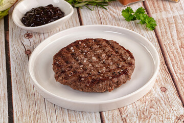 Grilled juicy beef cutlet for burger