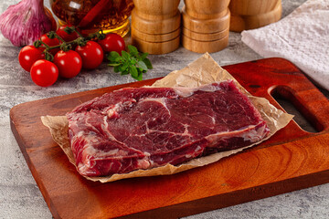 Gourmet raw rib eye steak