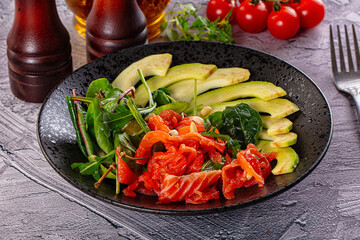 Dietary salad with salmon and avocado
