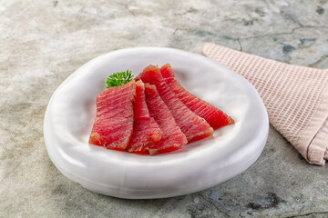 Raw red tuna sashimi slices
