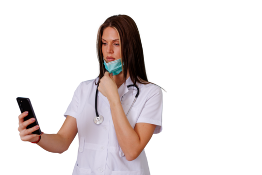 Healthcare professional doing a video call on mobile phone, pulling down medical mask, telehealth medical consultation - Powered by Adobe
