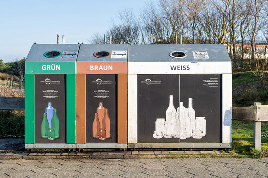 Norderney, Germany - November 11, 2025: Abfallwirtschaftsbetrieb Landkreis Aurich glass collection containers