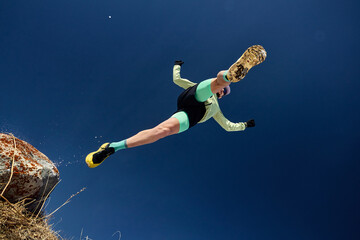 Man running in the winter mountains