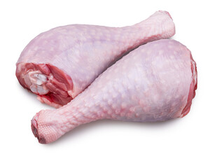 Raw legs of turkey or turkey drumsticks isolated on white background. File contains clipping path.