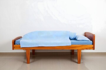 Simple Wooden Folding Bed with Blue Bedding in a Minimalist Room