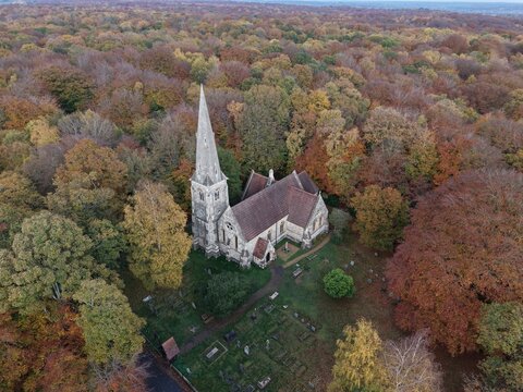 High Beach Church Epping forest UK in autumn vibrate trees colours  drone,aerial