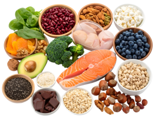 A colorful assortment of healthy foods including fresh salmon, berries, nuts, seeds, vegetables, and grains arranged together