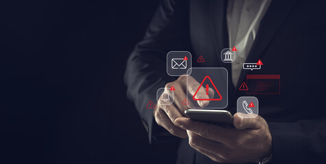 Cybersecurity warning on mobile phone showing alert messages and phishing scams targeting email,...