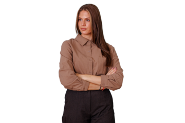 Confident young businesswoman standing with arms crossed, looking sideways, serious professional posing for portrait, transparent background