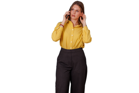 Serious young woman standing, talking on cell phone, managing business communication and problems, transparent background