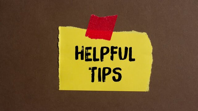 Helpful tips message writing on ripped torn paper background