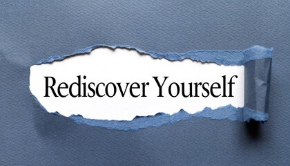 Inspirational "Rediscover Yourself" Message Revealed Through Torn Blue Paper; Good for self-help blogs, mental health awareness, and personal growth content.