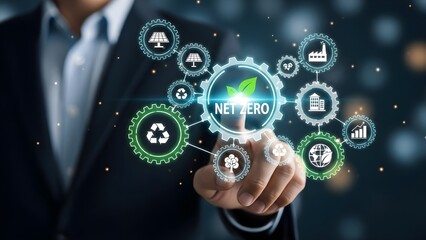 Businessmans hand touches a futuristic holographic display with net zero at the center, surrounded by gears representing environmental sustainability, renewable energy, and carbon reduction initiative