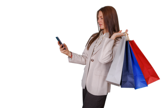 Woman carrying shopping bags, using smartphone for mobile commerce and browsing digital content after retail therapy. Transparent background