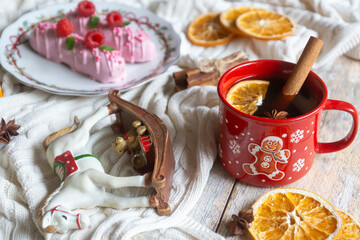 New Year is just around the corner, and on the table is hot tea with oranges and spices, as well as a children's toy horse - a symbol of 2026.