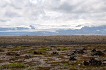 Katla Geopark Iceland, view across field to glacier on an overcast day