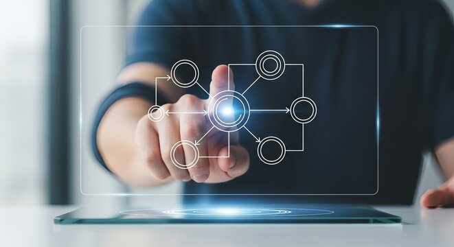 Modern business person interacting with digital flowchart interface on a tablet device