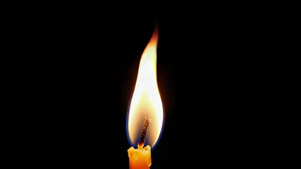 Close-up of burning candle flame