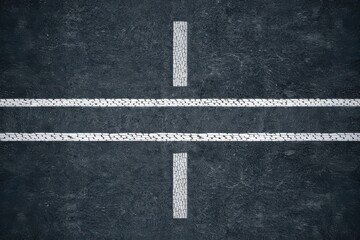 Asphalt road surface with double white lines and tire marks. 60