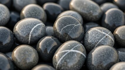 Relaxing smooth pebbles with unique white stripes, perfect for zen gardens, wellness retreats, and holistic design projects with natural elements